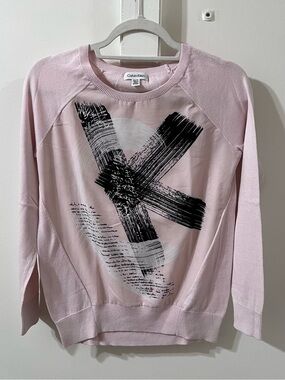 Calvin Klein Pale Pink Crewneck Sweater Fits an S.